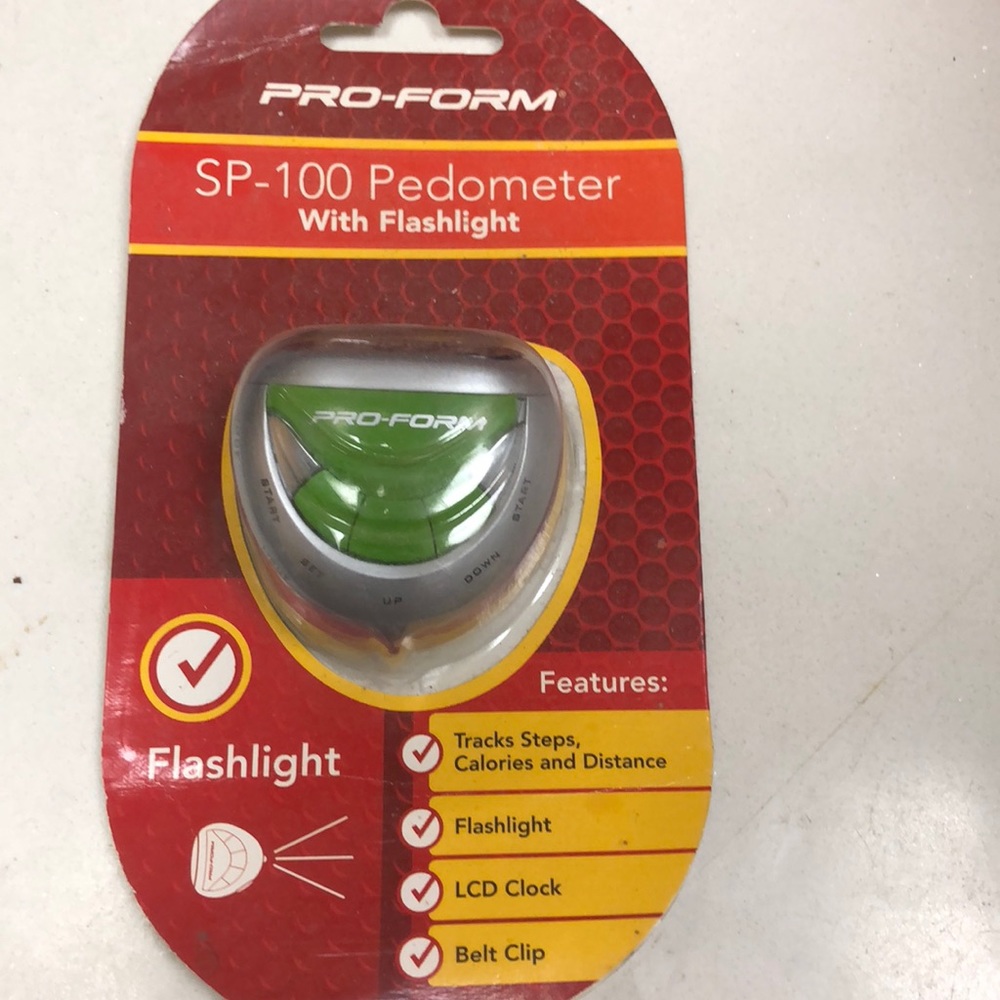 Pro-form SP-100 pedometer with flashlight clock
